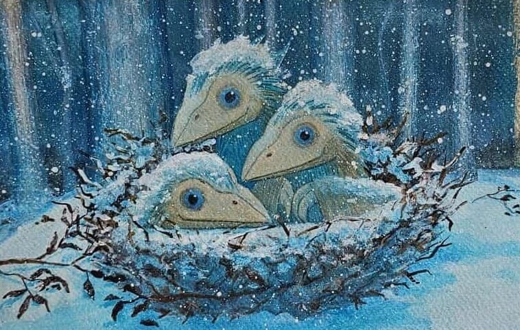 Three blue birds huddle together in a snowy nest during winter.